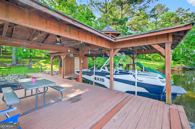 100 Tanglewood Rd, Eatonton, GA 31024 - dock area with boat lift and a water view