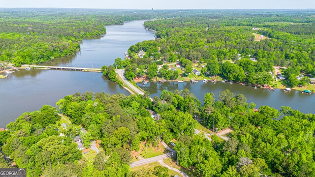 100 Tanglewood Rd, Eatonton, GA 31024 - drone / aerial view featuring a water view and a forest view