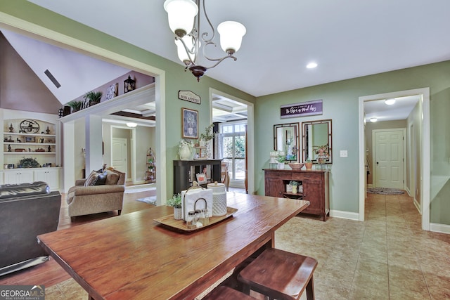 dining space with recessed lighting, baseboards, a chandelier, and built in shelves
