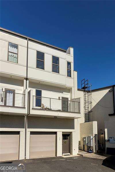 view of building exterior with an attached garage
