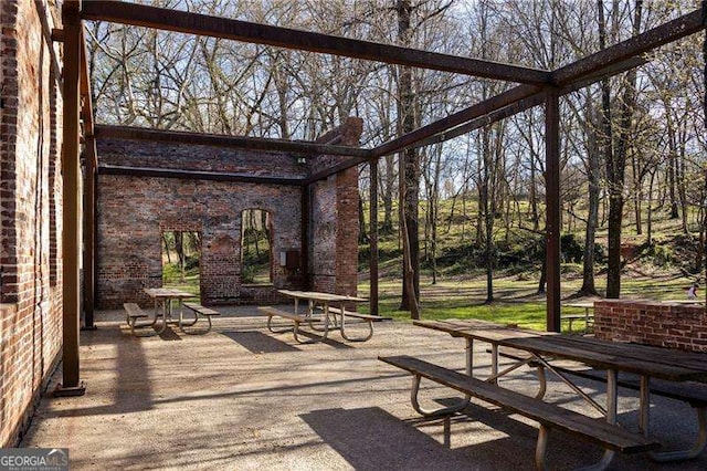 surrounding community featuring a patio area