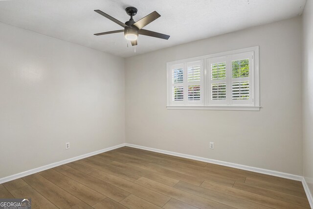 3813 Wingate Dr, Columbus, GA 31909 - unfurnished room with a ceiling fan, baseboards, and wood finished floors