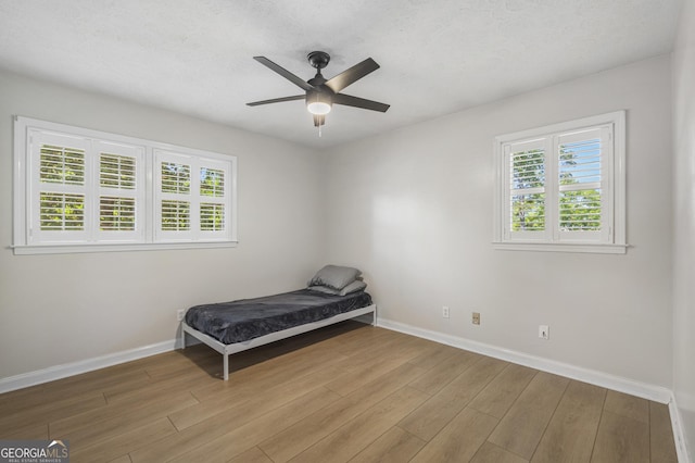 3813 Wingate Dr, Columbus, GA 31909 - unfurnished bedroom with baseboards and multiple windows