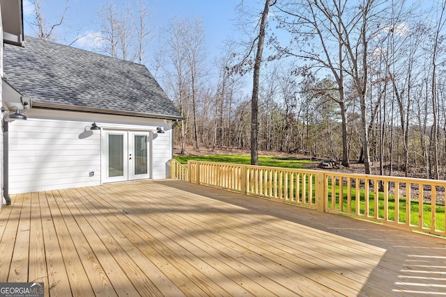 wooden deck featuring french doors