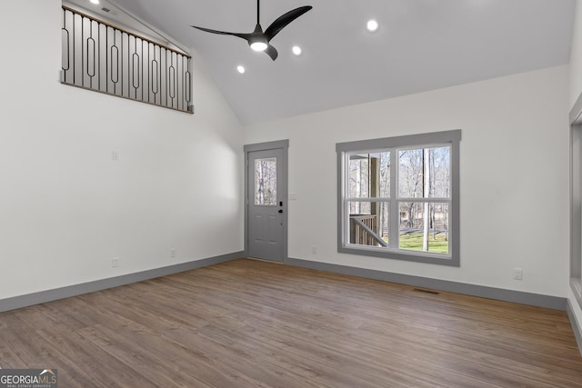 unfurnished living room with visible vents, a ceiling fan, wood finished floors, and recessed lighting