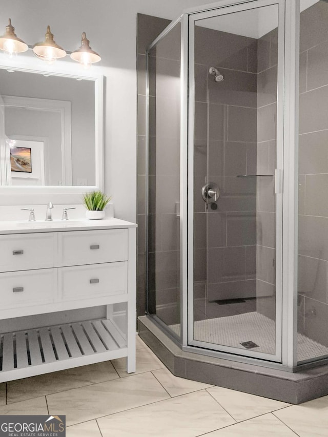 full bath featuring vanity and a stall shower