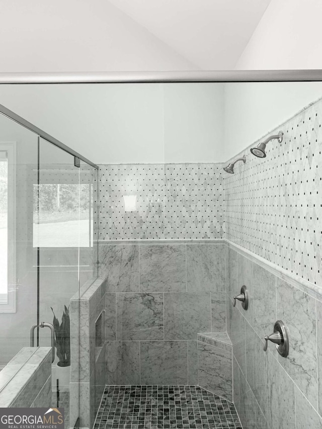 bathroom featuring a stall shower