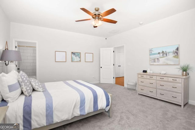 bedroom with light colored carpet, a ceiling fan, and baseboards