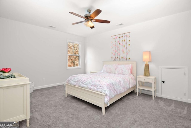 bedroom featuring visible vents, carpet, ceiling fan, and baseboards