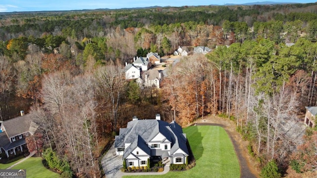 bird's eye view with a view of trees