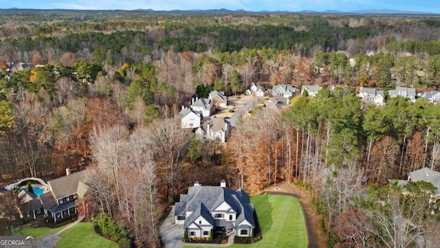 bird's eye view with a view of trees