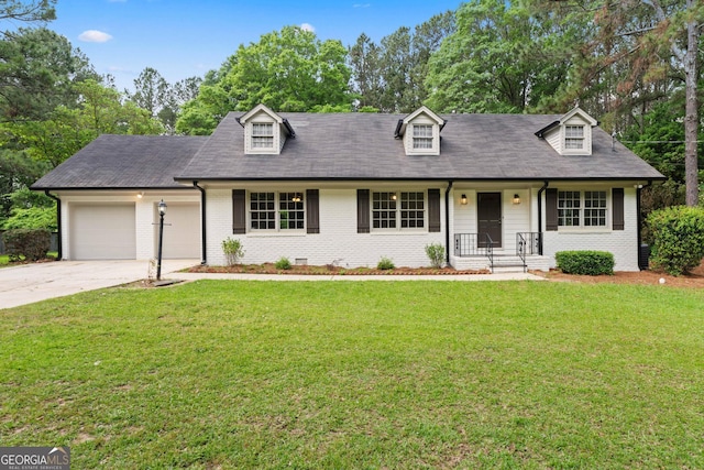 380 Grady Ave, Fayetteville, GA 30214 - cape cod-style house with a front lawn, an attached garage, brick siding, a porch, and driveway