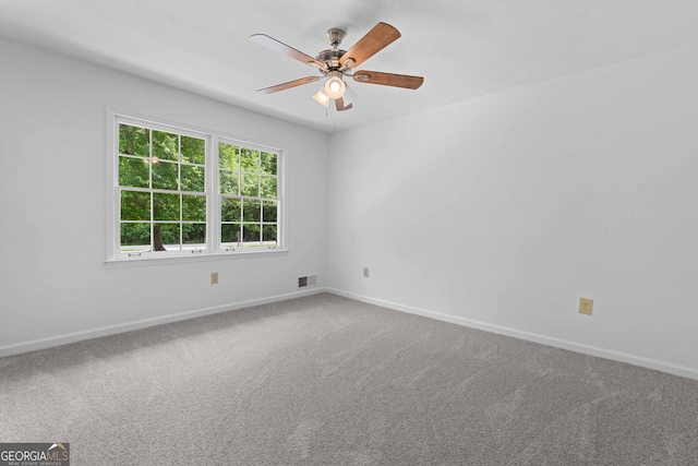 380 Grady Ave, Fayetteville, GA 30214 - carpeted spare room with baseboards, a ceiling fan, and visible vents