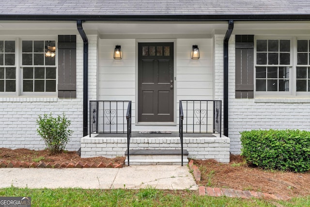 380 Grady Ave, Fayetteville, GA 30214 - doorway to property with brick siding and covered porch