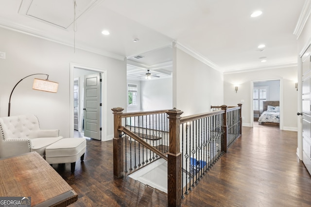 hall with attic access, recessed lighting, wood finished floors, and an upstairs landing