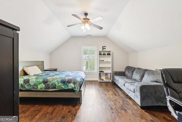 bedroom with a ceiling fan, visible vents, lofted ceiling, and hardwood / wood-style floors