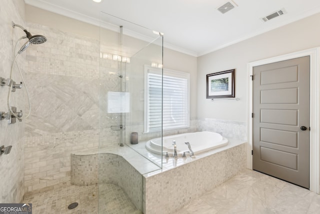 bathroom with visible vents, ornamental molding, a garden tub, and a tile shower