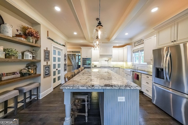 150 Shady Grove Ln, Alpharetta, GA 30009 - kitchen with appliances with stainless steel finishes, a breakfast bar area, beam ceiling, dark wood-style floors, and decorative backsplash