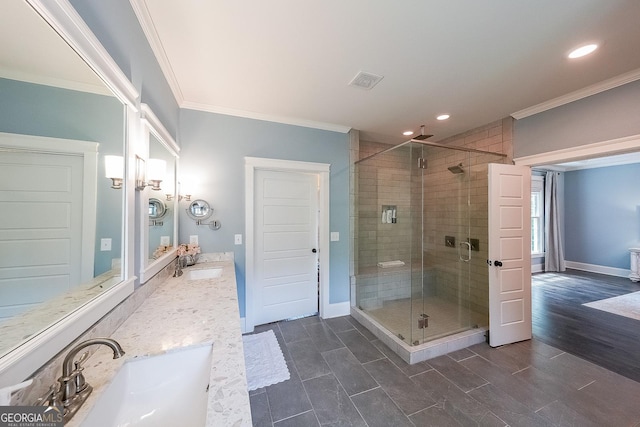 150 Shady Grove Ln, Alpharetta, GA 30009 - bathroom featuring ornamental molding, a shower stall, recessed lighting, baseboards, and vanity