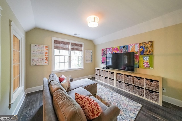 150 Shady Grove Ln, Alpharetta, GA 30009 - living room featuring vaulted ceiling, baseboards, and wood finished floors
