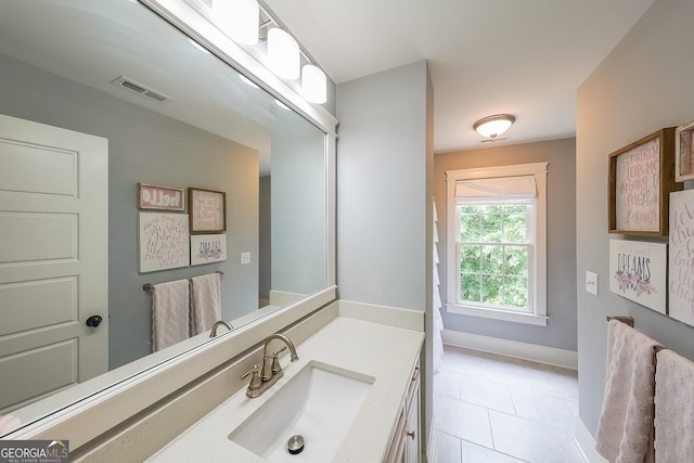 150 Shady Grove Ln, Alpharetta, GA 30009 - bathroom with tile patterned flooring and vanity