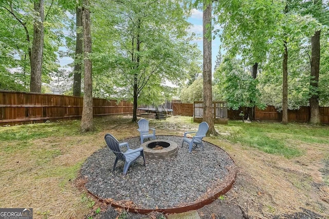 150 Shady Grove Ln, Alpharetta, GA 30009 - view of yard with a fire pit and a trampoline