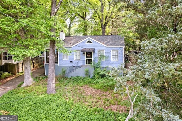 1941 Headland Dr, East Point, GA 30344 - view of front of property featuring fence and a chimney