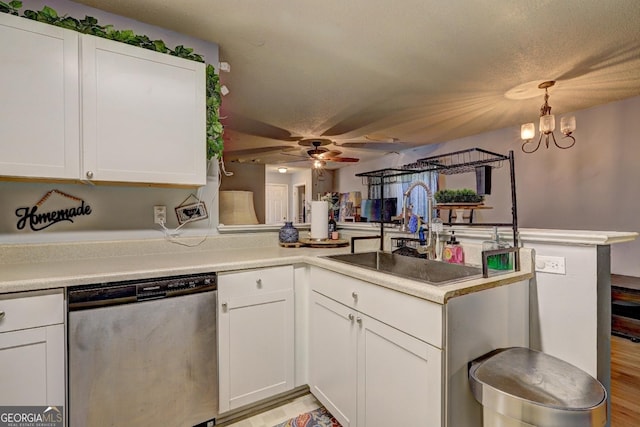 172 Evergreen Dr, Jackson, GA 30233 - kitchen featuring a sink, white cabinets, ceiling fan with notable chandelier, and dishwasher
