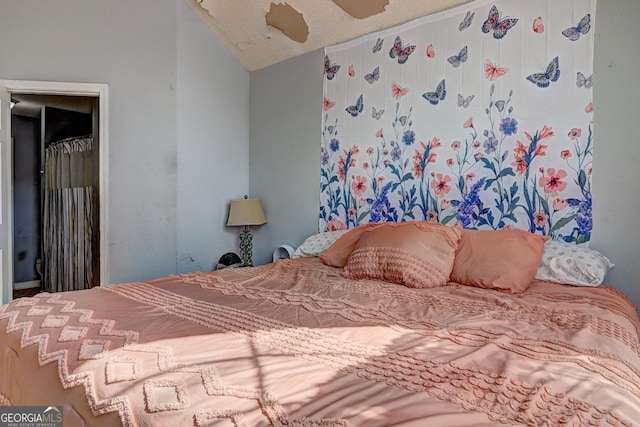 172 Evergreen Dr, Jackson, GA 30233 - bedroom with a ceiling fan and lofted ceiling