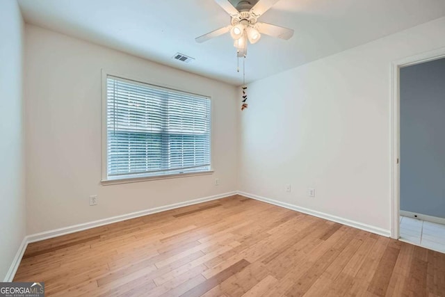 1259 Crescentwood Ln, Decatur, GA 30032 - empty room with baseboards, ceiling fan, visible vents, and wood finished floors