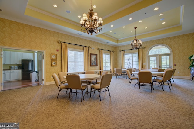 3204 Village Blvd SE, Rome, GA 30161 - carpeted dining space featuring a tray ceiling, a chandelier, wallpapered walls, crown molding, and recessed lighting