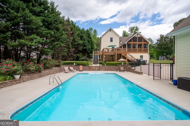 96 Grover Way, Dallas, GA 30157 - view of swimming pool featuring stairs, a patio, fence, a wooden deck, and a sunroom