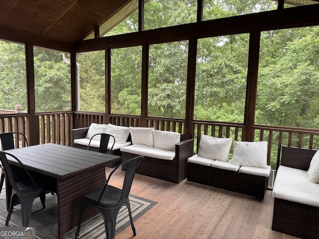 sunroom / solarium with an outdoor living space