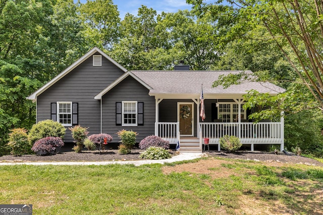 588 Peachtree Dr SE, White, GA 30184 - ranch-style house with a chimney, a front lawn, and covered porch