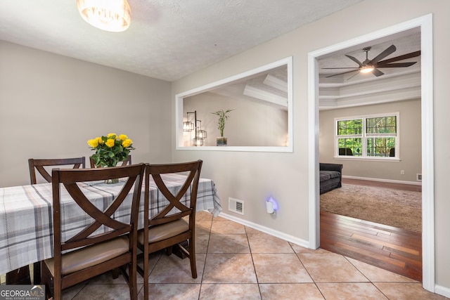 588 Peachtree Dr SE, White, GA 30184 - dining room featuring ceiling fan and light tile patterned floors