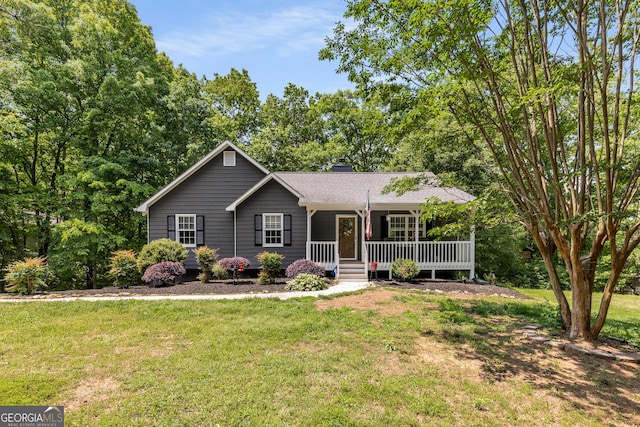 588 Peachtree Dr SE, White, GA 30184 - ranch-style house with a porch, a front yard, and a chimney