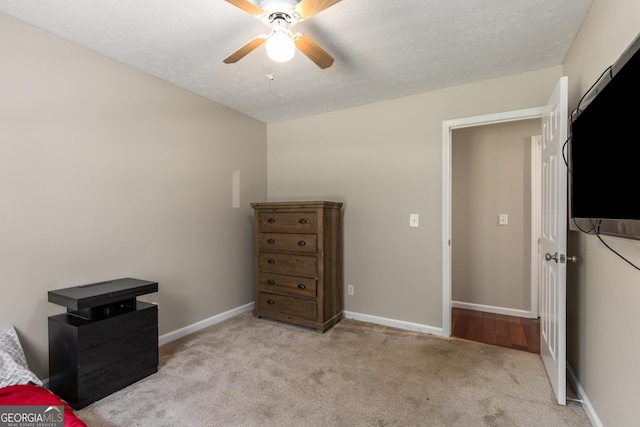 588 Peachtree Dr SE, White, GA 30184 - bedroom featuring light colored carpet and a ceiling fan