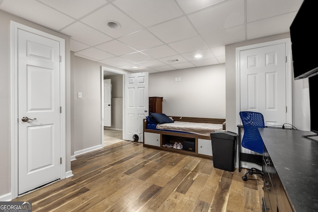 588 Peachtree Dr SE, White, GA 30184 - office featuring hardwood / wood-style flooring, a drop ceiling, and recessed lighting