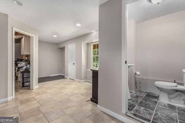588 Peachtree Dr SE, White, GA 30184 - bathroom with recessed lighting and stone finish flooring
