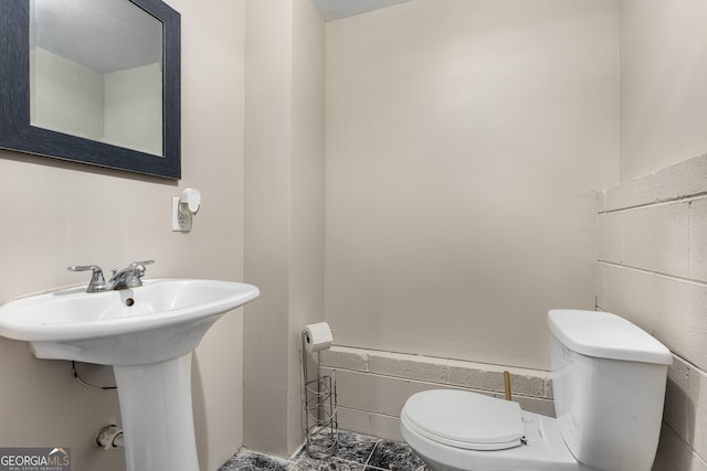 588 Peachtree Dr SE, White, GA 30184 - half bath featuring toilet and a sink