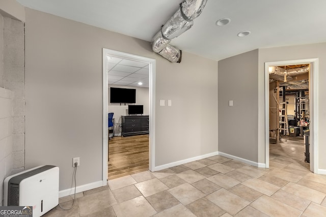 588 Peachtree Dr SE, White, GA 30184 - unfurnished dining area with baseboards and recessed lighting