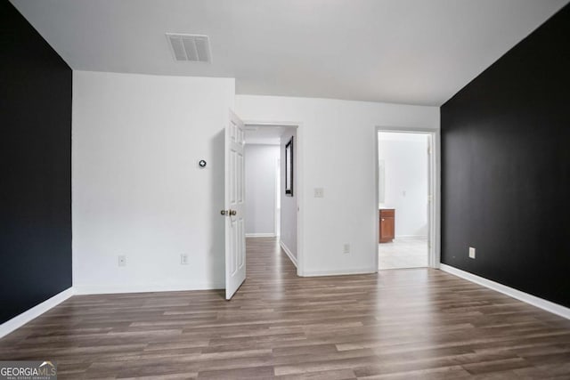 5244 Carrington Park Dr, Powder Springs, GA 30127 - interior space featuring baseboards, visible vents, and wood finished floors