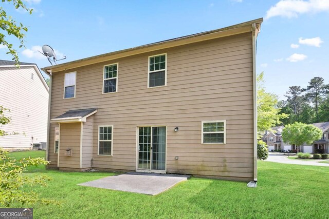 5244 Carrington Park Dr, Powder Springs, GA 30127 - back of house with a patio area and a yard