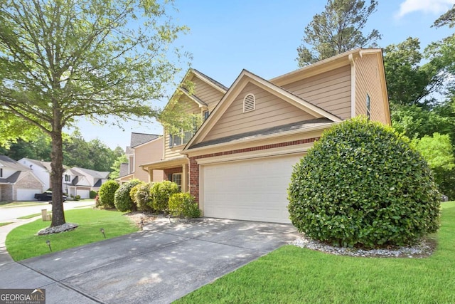 5244 Carrington Park Dr, Powder Springs, GA 30127 - view of front of house featuring an attached garage, a front lawn, brick siding, and concrete driveway