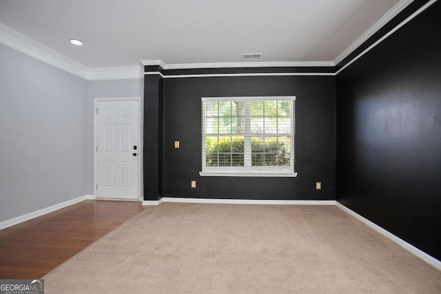 5244 Carrington Park Dr, Powder Springs, GA 30127 - spare room with baseboards, visible vents, and ornamental molding