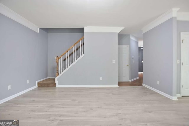 5244 Carrington Park Dr, Powder Springs, GA 30127 - unfurnished living room with stairway, baseboards, ornamental molding, and wood finished floors