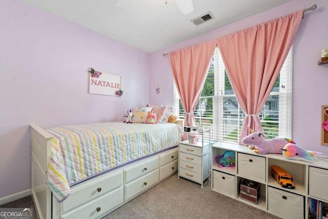 1126 Gate Post Ct, Powder Springs, GA 30127 - carpeted bedroom featuring visible vents and ceiling fan