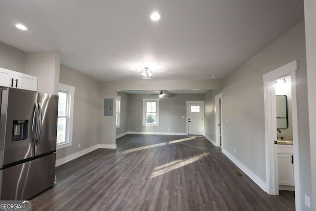 interior space with recessed lighting, baseboards, dark wood finished floors, and ceiling fan