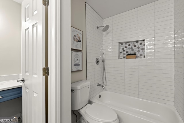 full bathroom featuring vanity, bathing tub / shower combination, and toilet