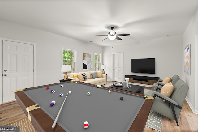 recreation room with light wood finished floors, pool table, baseboards, and ceiling fan